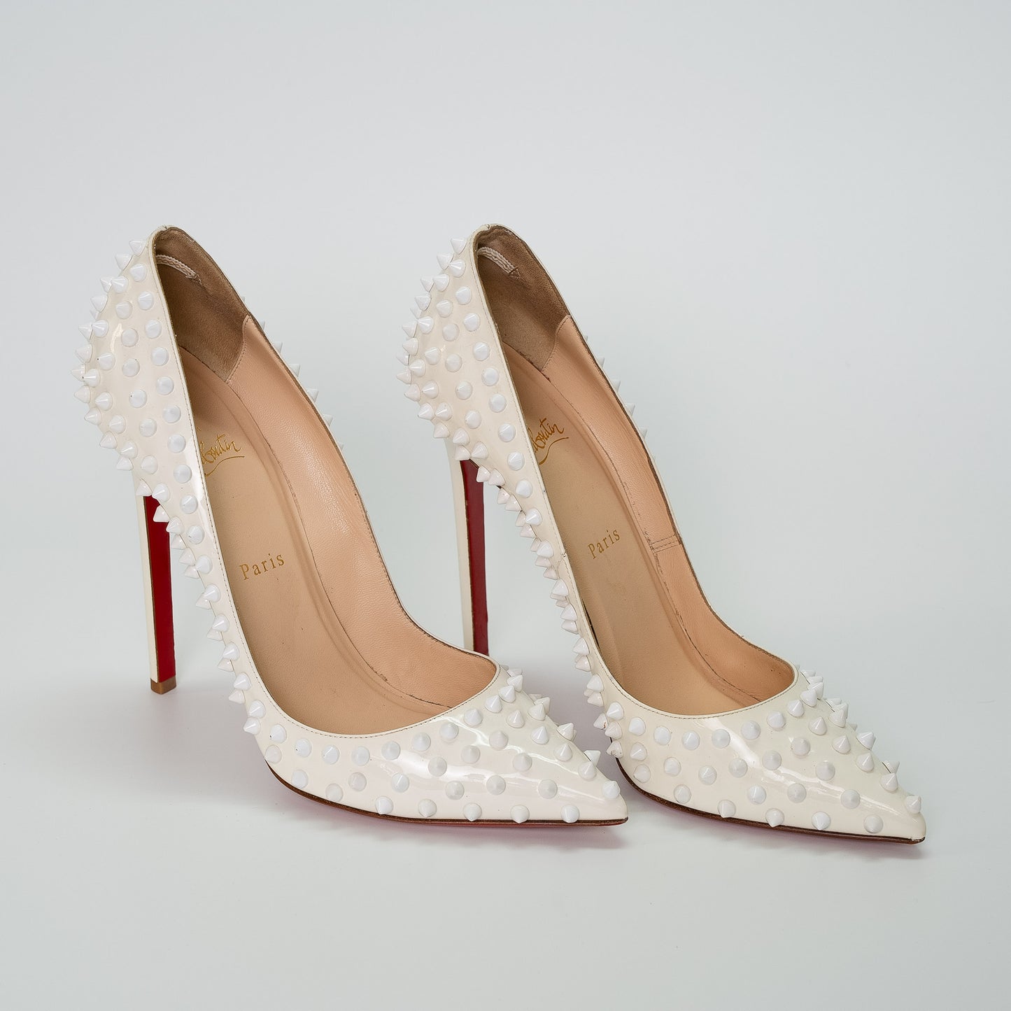 Christian Louboutin White Spike Leather Pumps