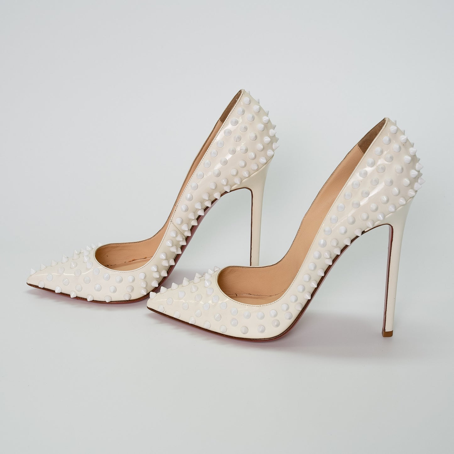 Christian Louboutin White Spike Leather Pumps