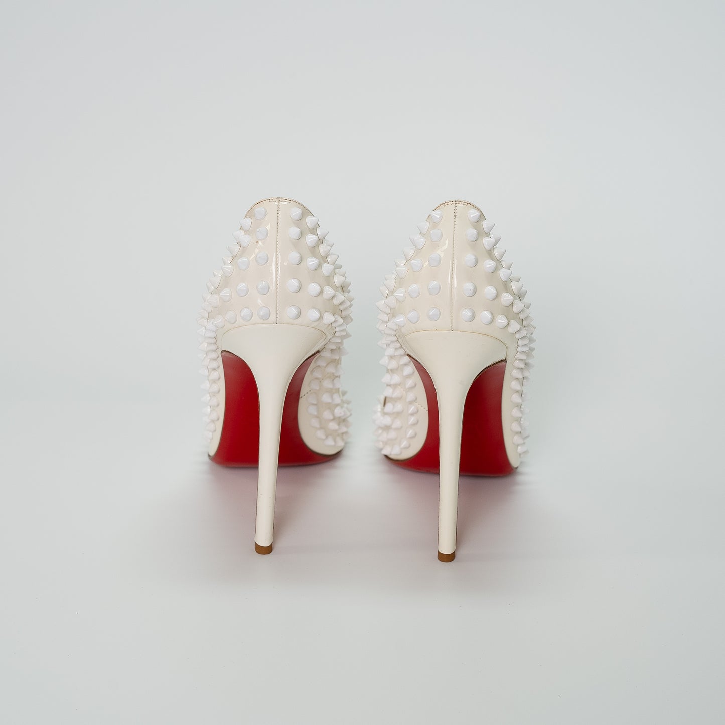 Christian Louboutin White Spike Leather Pumps