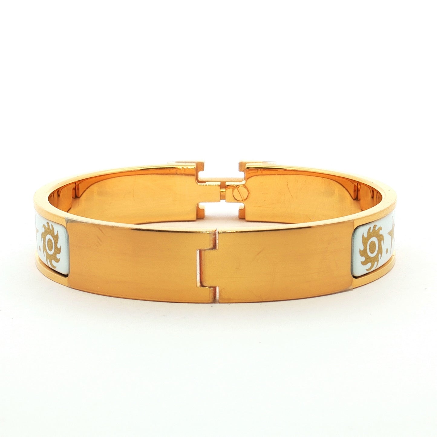Hermès Clic H Patterned White Enamel Gold Bracelet