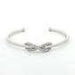 Tiffany & Co. Infinity Diamond Gold Cuff Bracelet