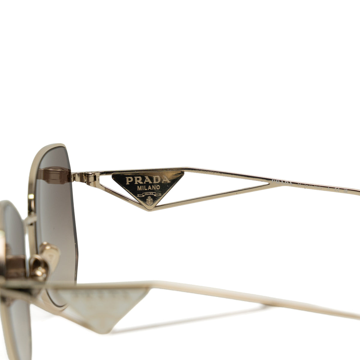 Prada SPR 57Y Pale Gold Sunglasses