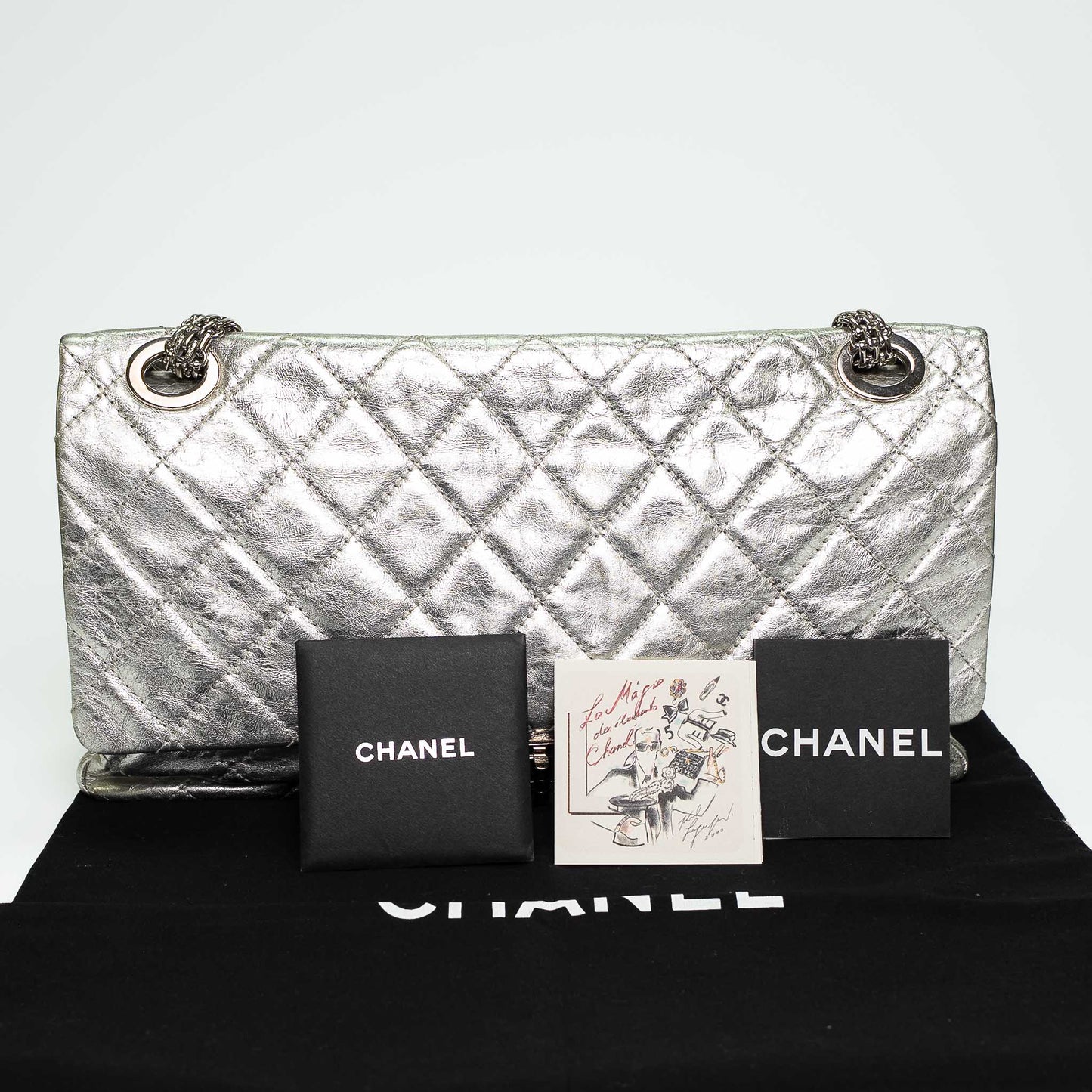 Chanel Metallic Silver Maxi Double Flap Bag (2006)