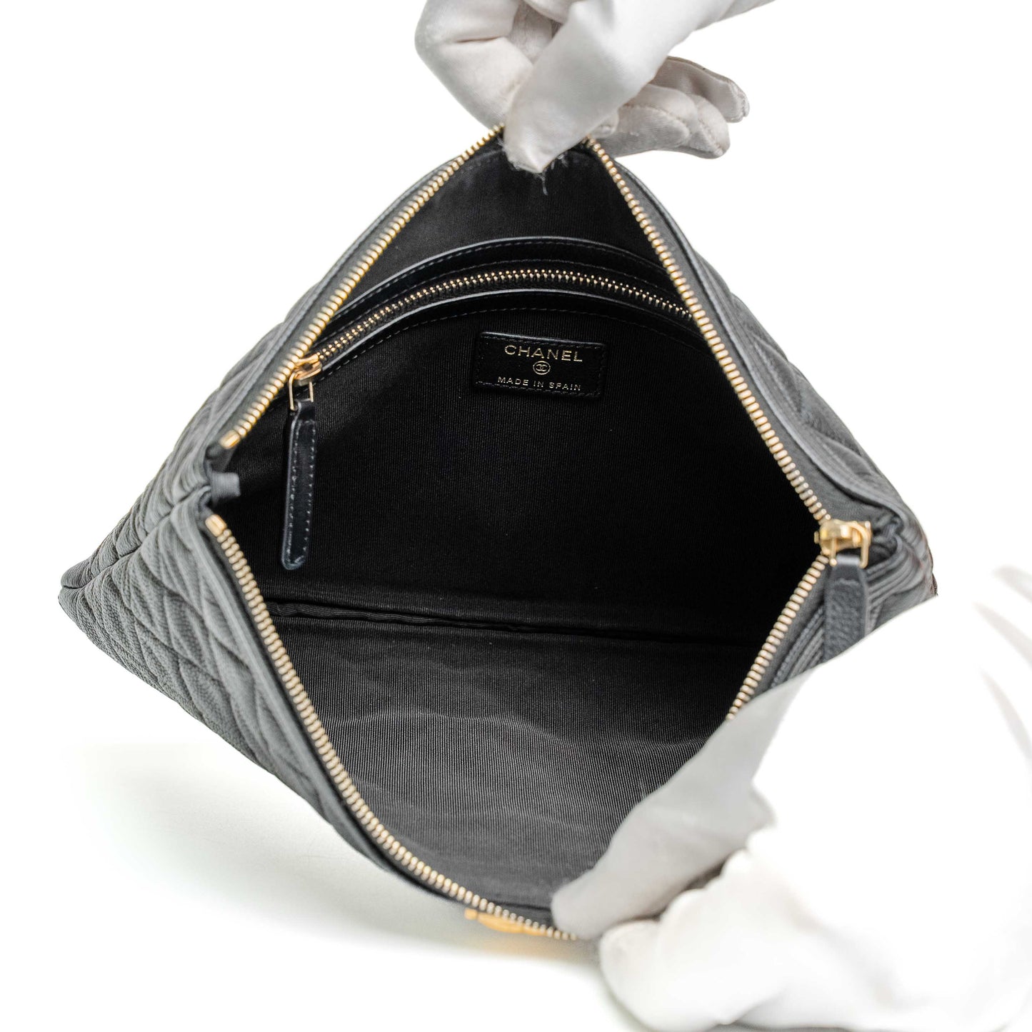 Chanel Quilted Caviar Boy Clutch