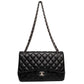 Chanel Classic Jumbo Black Caviar Flap Bag