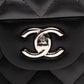 Chanel Classic Jumbo Black Caviar Flap Bag