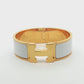 Hermès Clic Clac H White Enamel Gold Bracelet