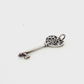 Elegant Tiffany & Co. Heart Key Pendant in Sterling Silver