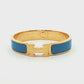 Hermès Clic H Blue Enamel Gold Bracelet
